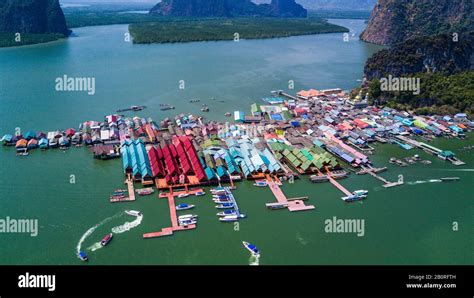 Aerial panorama view over Ko Panyi floating village in souther of Thailand. Ko Panyi is a ...