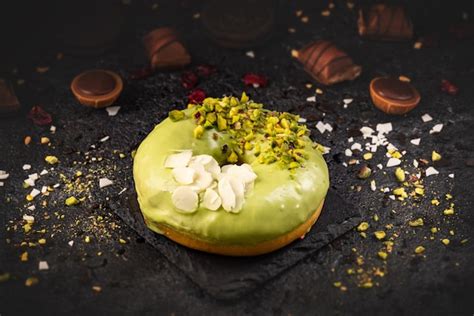 Premium Photo | Donut in green glaze