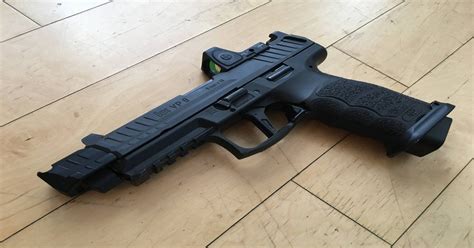 Leaked image of Hero Gun from John Wick 4: Continental War; VP9 w/compensator & RMR : HecklerKoch