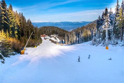 Ski Slope in Bansko, Bulgaria and Skiers Stock Image - Image of cafe ...