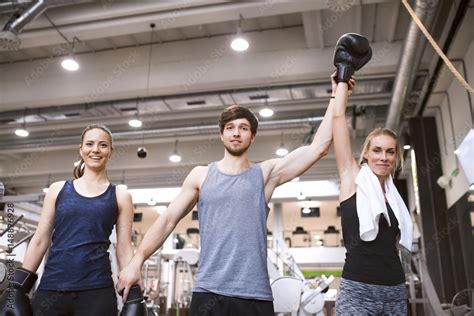 Referee presenting winner after boxing fight Stock Photo | Adobe Stock