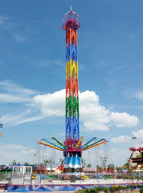 giant swing tower ride in the amusement park Theme Parks Rides ...