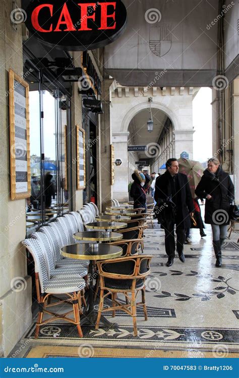 Sightseers Walking Past Outdoor Cafes on the Streets of Paris,France ...