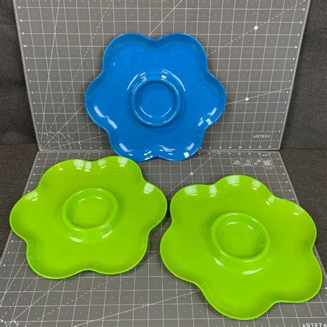 #192 Plastic Floral Plates | EstateSales.org