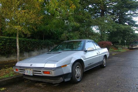 OLD PARKED CARS.: 1986 Subaru XT Turbo.