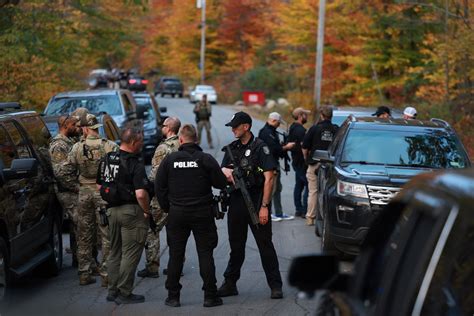 Police surround home in search of Maine shooting suspect - Newsweek