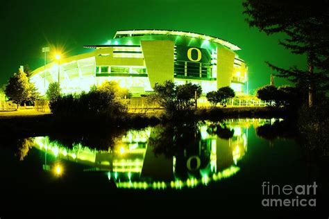 Green Power- Autzen at night Photograph by Michael Cross - Fine Art America