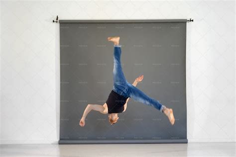 Acrobat Performing Aerial Cartwheel - Stock Photos | Motion Array