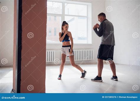 Woman Training Boxing with Personal Trainer. Instructor Teaching Female ...