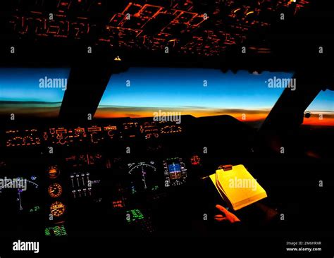 Cockpit of a passenger plane. View from the cockpit during Stock Photo ...