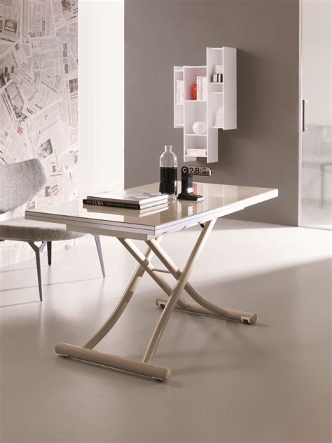 The Atlas is a transforming coffee table that lifts and extends into a dining table ...