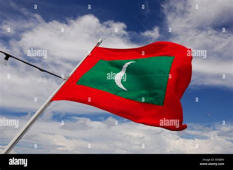 Maldivian flag, Indian Ocean Stock Photo - Alamy