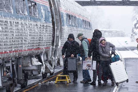 In photos: Winter storm lashes U.S. Northeast with up to foot of snow