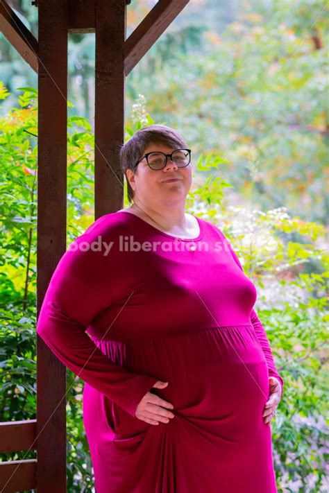 Fat Pregnancy Stock Photo: Pregnant Woman in Park - Body Liberation Photos & Stock