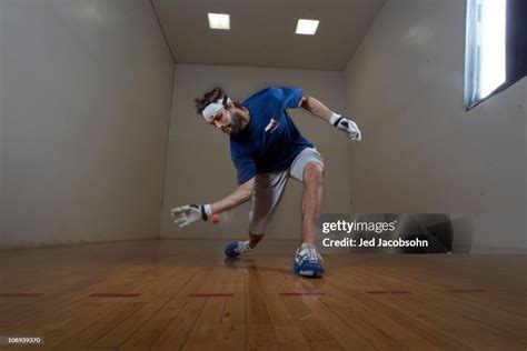 Portrait of former NFL QB Jake Plummer playing handball during photo ...