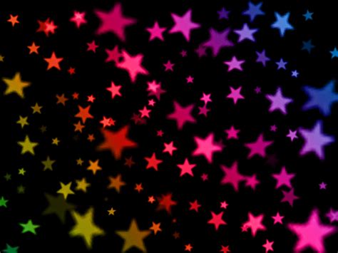 colorful stars are shown against a black background