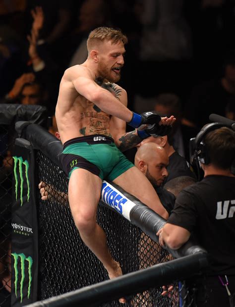 Conor McGregor knocks out Jose Aldo at UFC 194 - Photos: Conor McGregor ...