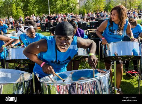 Steel pan (steel drums) players at the Thames Festival 2012. Performance of One Thousand Pans by ...