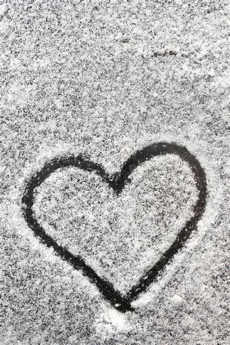 Heart Shape Drawn with the Snow Stock Photo - Image of arrow, heart: 37163566