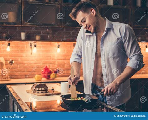 Guy cooking stock photo. Image of smart, adult, expression - 85109048