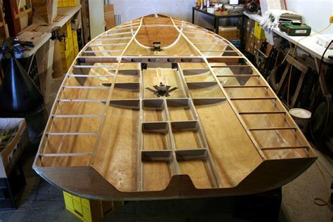 Sam Devlin has been designing and building fine wood epoxy resin boats using the stitch Most of ...