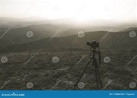 Camera on a tripod stock image. Image of lens, background - 111866135