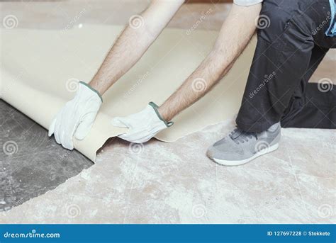 Contractor Removing an Old Linoleum Flooring Stock Photo - Image of ...