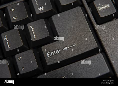 Black computer keyboard close-up. Focused on 'Enter' key Stock Photo ...