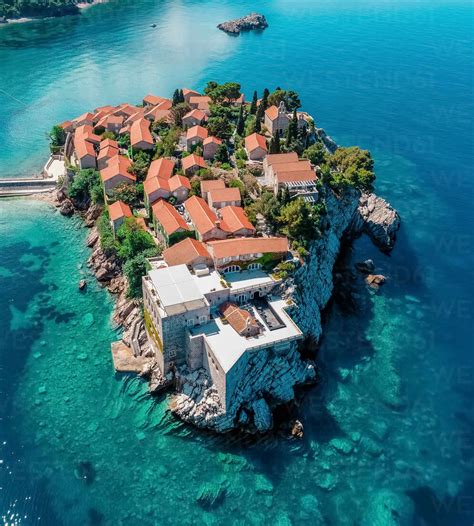 Aerial view of Sveti Stefan beautiful luxury island Budva, Montenegro ...