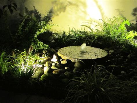 A water feature can add more drama after dark with good LED garden lighting. | Led gardening ...