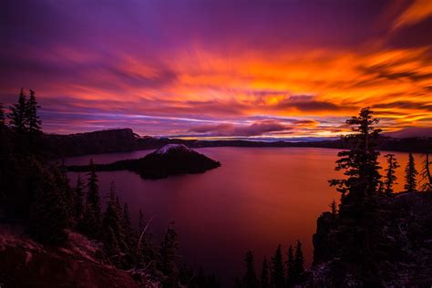 Sunrise over Crater Lake and Wizard Island in Oregon. | Crater lake, Sunrise, Lake