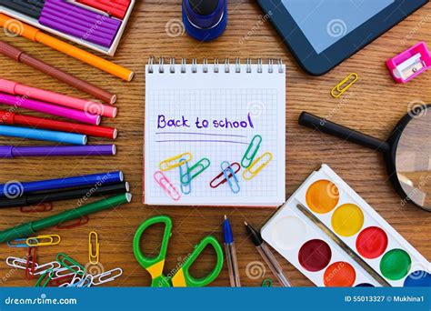 Stationery Objects. Office and School Supplies on the Table. Caption ...