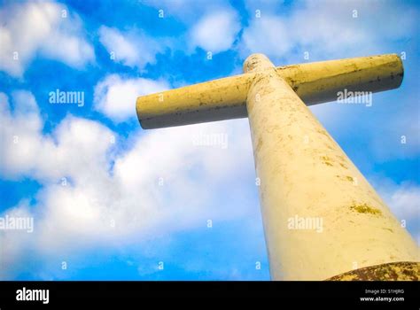 Sunken cemetery cross Stock Photo - Alamy