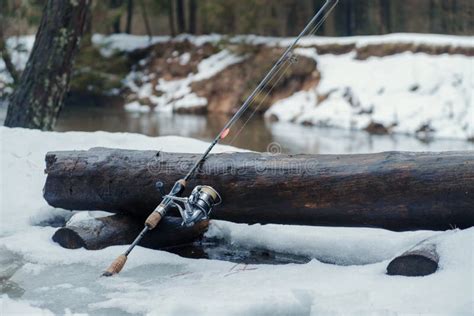 Fishing Gear on the Bank of a Winter River Stock Photo - Image of bait, line: 183298504