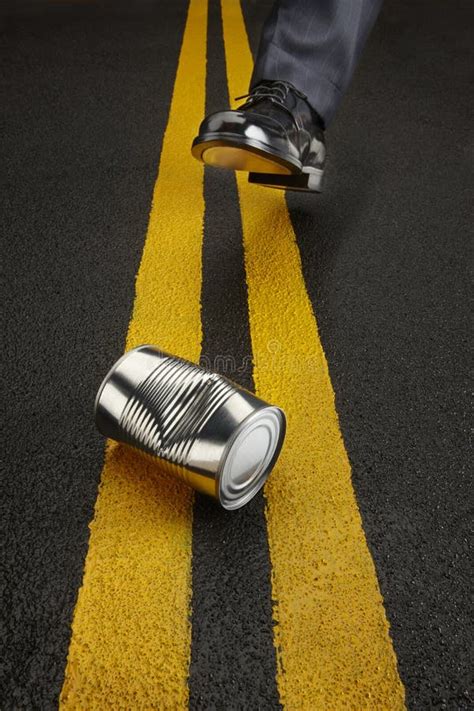 Kicking the Can Down the Road Stock Photo - Image of striped, shiny ...