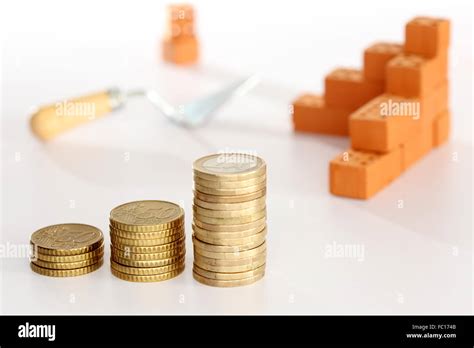 money and bricks Stock Photo - Alamy