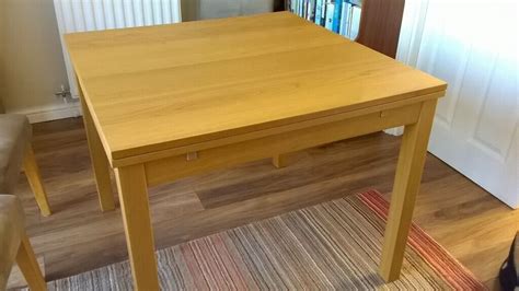 Ikea teak veneer dining table. 3ft x 3ft extends to 5ft x 6ft. In very good condition. | in ...