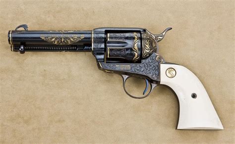 Custom engraved and 24 K gold inlaid Colt SAA revolver with the ...