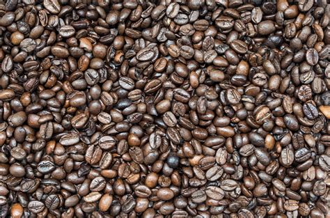 Roasted coffee beans background. 8850640 Stock Photo at Vecteezy