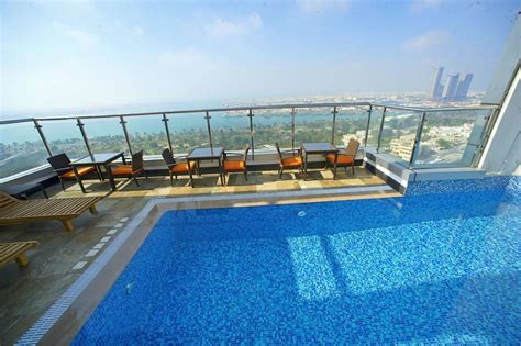 The luxury of Ramada Corniche includes a roof top pool that gives an ...