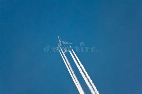 Airplane vapor trails stock image. Image of aviation - 102323977