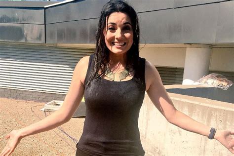 Natalie Sawyer gets soaked to the skin as Sky Sports News presenter is drenched by sprinklers at ...