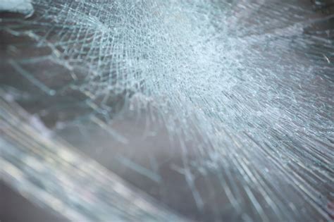 Premium Photo | Cracked glass texture background.