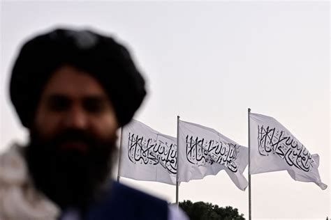 Taliban flag raised over seat of power in Kabul as world marks 20th ...