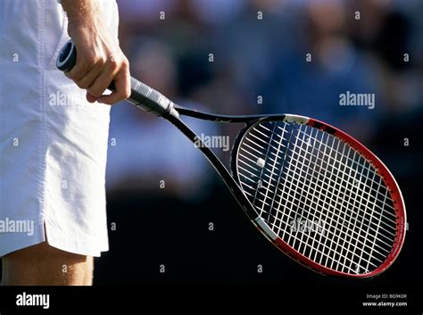 Tennis player on a grass court Stock Photo - Alamy