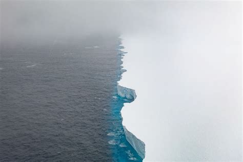 A23a iceberg seen with striking arches and cavernous hollows as it floats away from Antarctica | CNN