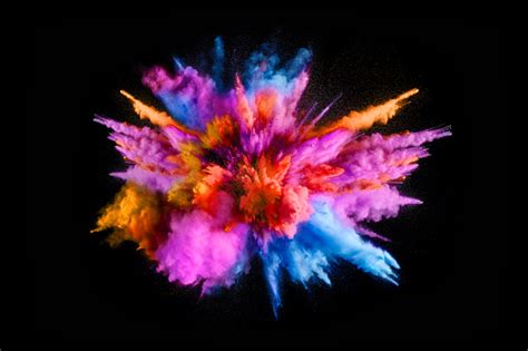 Explosion Of Colored Powder On Black Background Stock Photo - Download ...