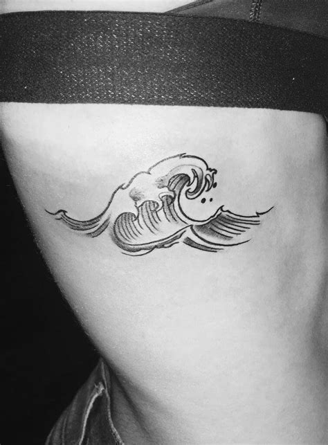 30 Most Attractive Ocean Wave Tattoo Design Ideas