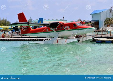 Seaplane Landing on Water Port Over Turquoise Water, Maldives Editorial ...