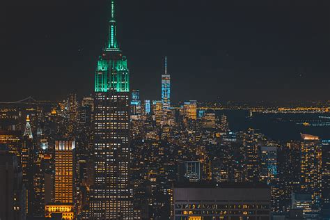 view of the empire state building with a nyc skyline lit up at night, nyc at night 4k HD Wallpaper